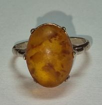 A 925 silver and unpolished amber ring Size Q