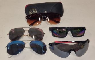 A collection of sunglasses to include one pair with case (5).