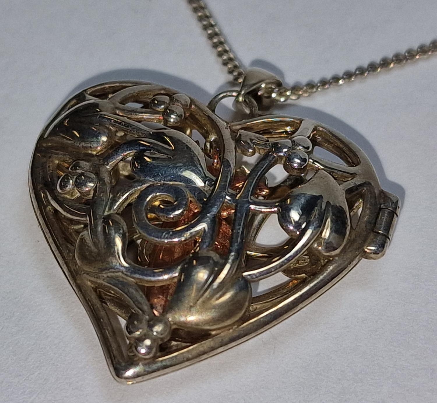 Clogau Welsh gold angel inside silver locket and chain. - Image 2 of 4
