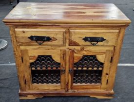 Contemporary heavy Mexican pine storage unit fitted with two drawers and double width cupboard