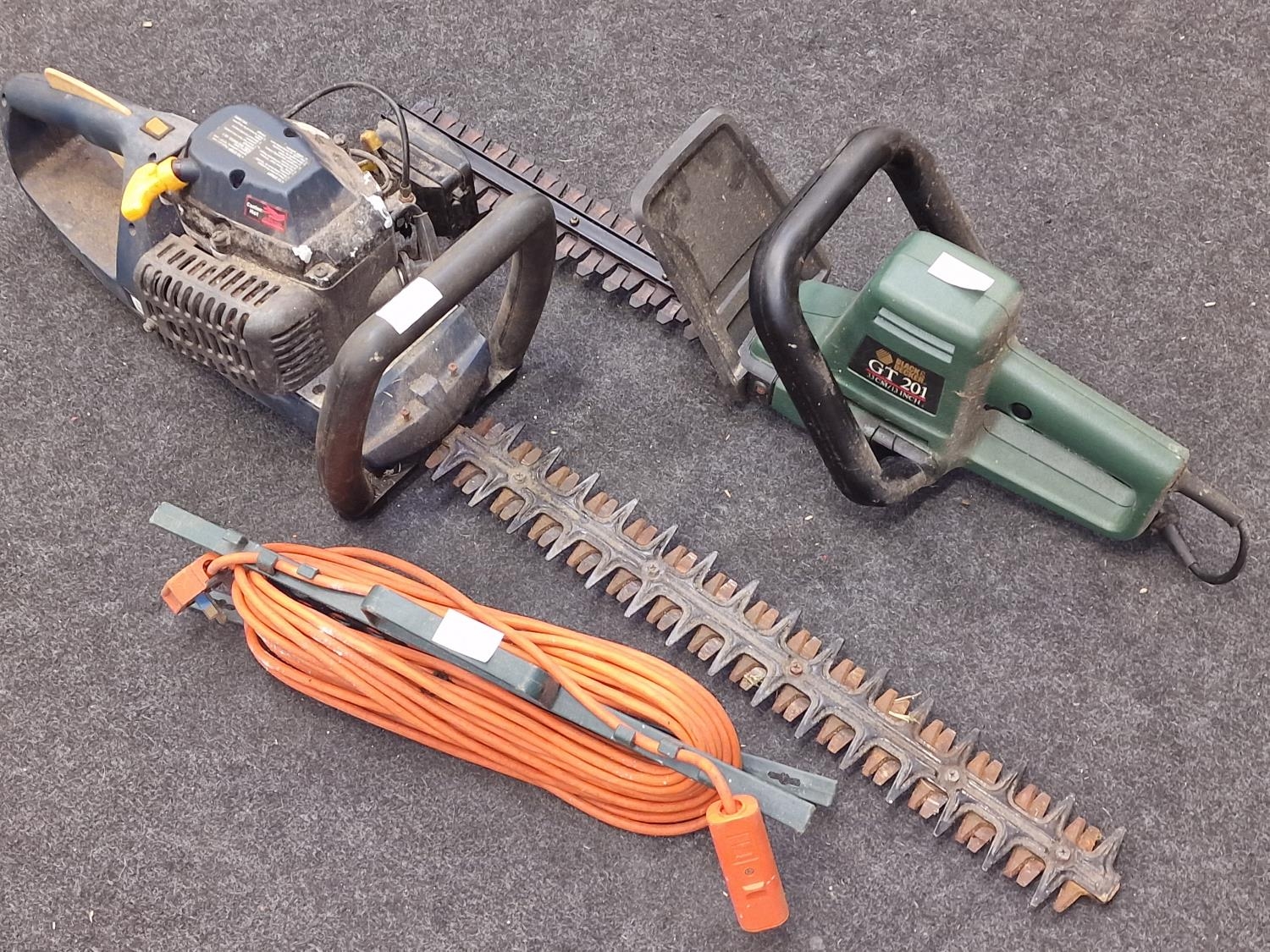 Petrol hedge trimmer together an electric hedge trimmer and lead - Image 2 of 2
