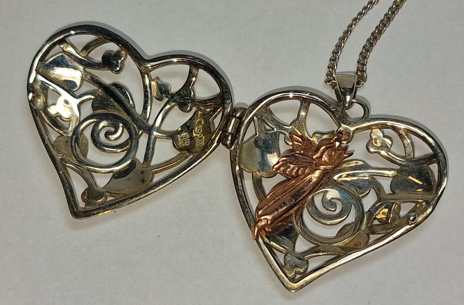 Clogau Welsh gold angel inside silver locket and chain. - Image 3 of 4
