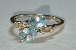 A 925 silver , Cz and light blue stone ring, Size P