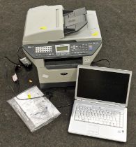 A Dell laptop together with a Brother Printer/copier MFC-8460N and manual.