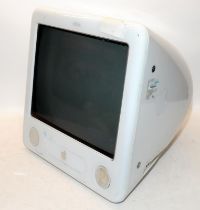 Vintage Apple E-Mac model A1002. Untested but vendor informs removed from a working environment