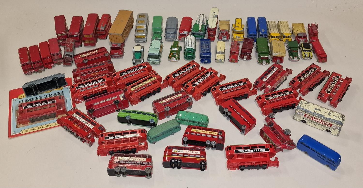 Collection of vintage unboxed mainly Matchbox play worn die cast vehicles to include trams and