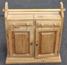 A modern pine kitchen wall mounted storage rack/cupboard.