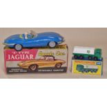 Vintage boxed Marx Toys "E" type Jaguar friction sports car (missing hardtop) together with a
