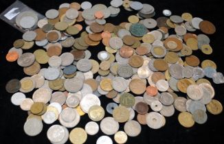 Tub of world coins