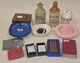Collection of breweriana items and lighters to include Zippo and Dunhill examples.