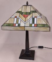 A contemporary Tiffany style table lamp approx 60cm tall.