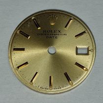 A genuine Rolex 14mm dial.