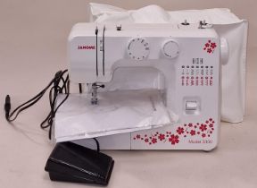 Janome model 3300 electric sewing machine with instruction book, power lead and foot pedal.