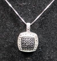 A new black/white accent diamond 925 silver pendant.