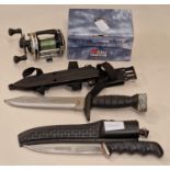 Japanese Typhoon divers knife together with another knife and a boxed Ambassadeaur fishing reel.
