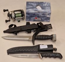 Japanese Typhoon divers knife together with another knife and a boxed Ambassadeaur fishing reel.