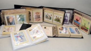 Eight albums of Royal Mail GB stamps postcards