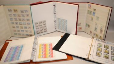 5 x albums mostly Jersey stamps mint stock sheets (one album near empty)