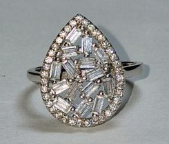 A pear shaped 925 sliver and CZ ring, Size M.