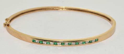 9ct gold Emerald and Diamond solid bangle 6cm internal diameter