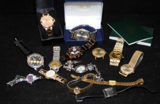 A collection of ladies and gents fashion watches to include a boxed Seiko Kinetic 5M42-0b50 and a