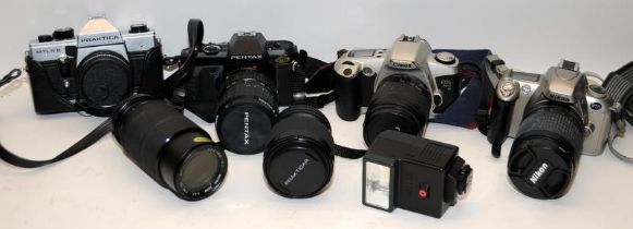Collection of vintage 35mm film SLKR cameras and associated lenses. Includes Nikon, Canon and Pentax