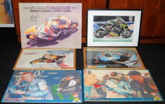 A collection of large pictures and prints relating to motorcycle racer Bradley Smith. Most are