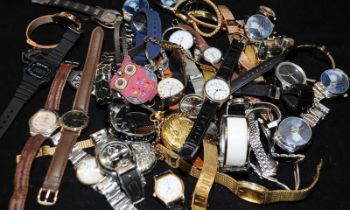 Large collection of ladies and gents quartz watches, some unworn, all with new batteries fitted