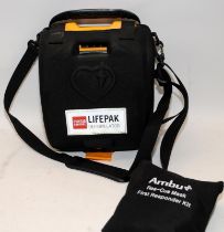 Physio Control Lifepak CR plus defibrillator c/w carry bag and wall fixing bracket