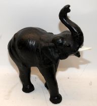 Vintage leather clad wooden elephant in the Liberty's style. 34cms tall