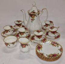 A Royal Albert old country roses coffee set for six including milk jug, sugar bowl and side plates.