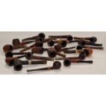 A collection of vintage smokers pipes.