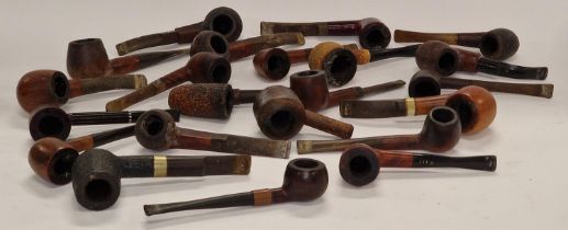 A collection of vintage smokers pipes.