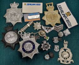 A collection of Police constabulary badges, whistle etc together with other collectables.