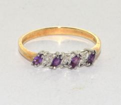 A 9ct gold amethyst and diamond ring Size R