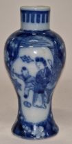 A Chinese blue and white vase 19cm tall.