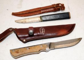Marttiini of Finland sheath knife, o/all length 25cms c/w another sheath knife