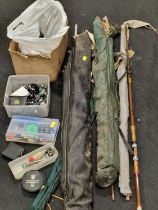 Large collection of assorted fishing items to include quantity of rods, reel and other items.