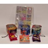 A large collection of Pokemon cards to include many holos together with two bags of marbles.