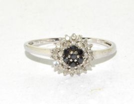 A Black/white diamond 9ct white gold ring Size R