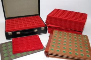 A quantity of trays suitable for coin collecting including a briefcase