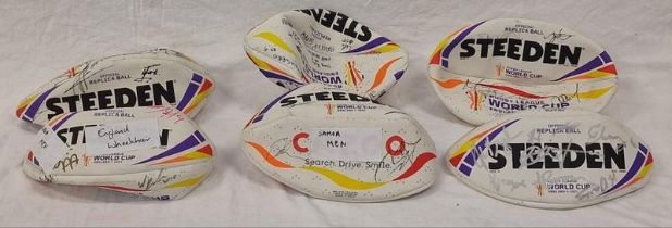 A collection of Steeden official replica Rugby World Cup 2021 balls, all with team signatures