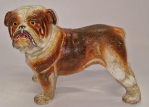 A cast metal bull dog figure.