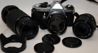 Vintage Pentax ME Super 35mm SLR camera with fitted Pentax 50mm prime lens and user guides. Lot also