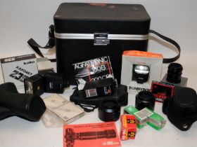 A collection of vintage photography accessories in a hard case kit bag. Includes camera cases,
