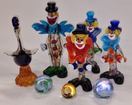 Quantity of coloured glassware to include Murano clowns and bird and three Caithness paperweights (