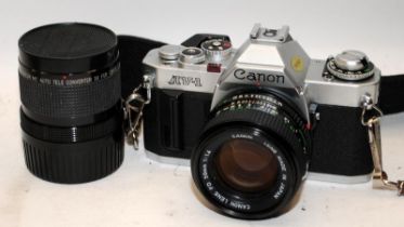 Canon AV-1 35mm film SLR camera. In excellent cosmetic condition. Complete with Canon FD 1:4 50mm