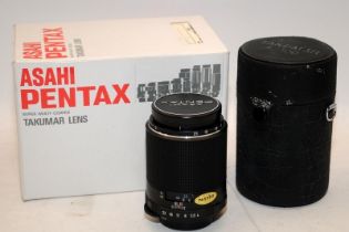 Vintage Asahi Pentax Macro Takumar 1:4 100mm camera lens. In excellent cosmetic condition with