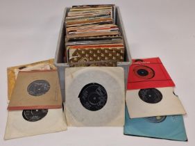 A box of various 45rpm singles.
