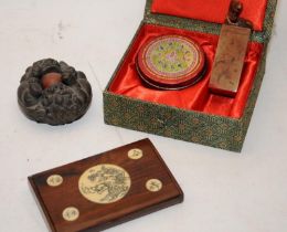 Collection of Oriental items to include a carved wood lion puzzle ball, a Chinese Chop carved wood